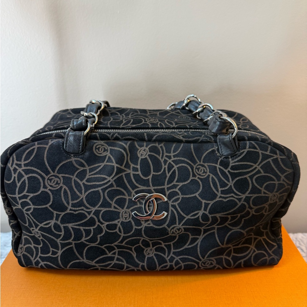 Chanel
Suede Camellia Bowler Bag
